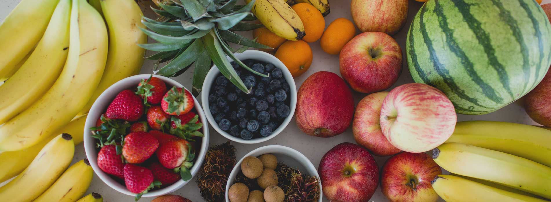 Fresh local produce watermelon, apple, banana, orange, blueberries, strawberries, kiwi