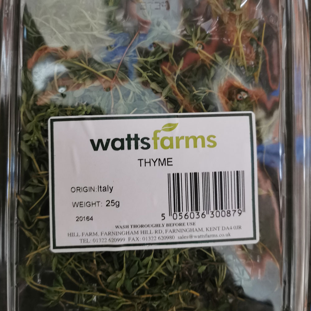 A punnet of fresh thyme herb farm grown