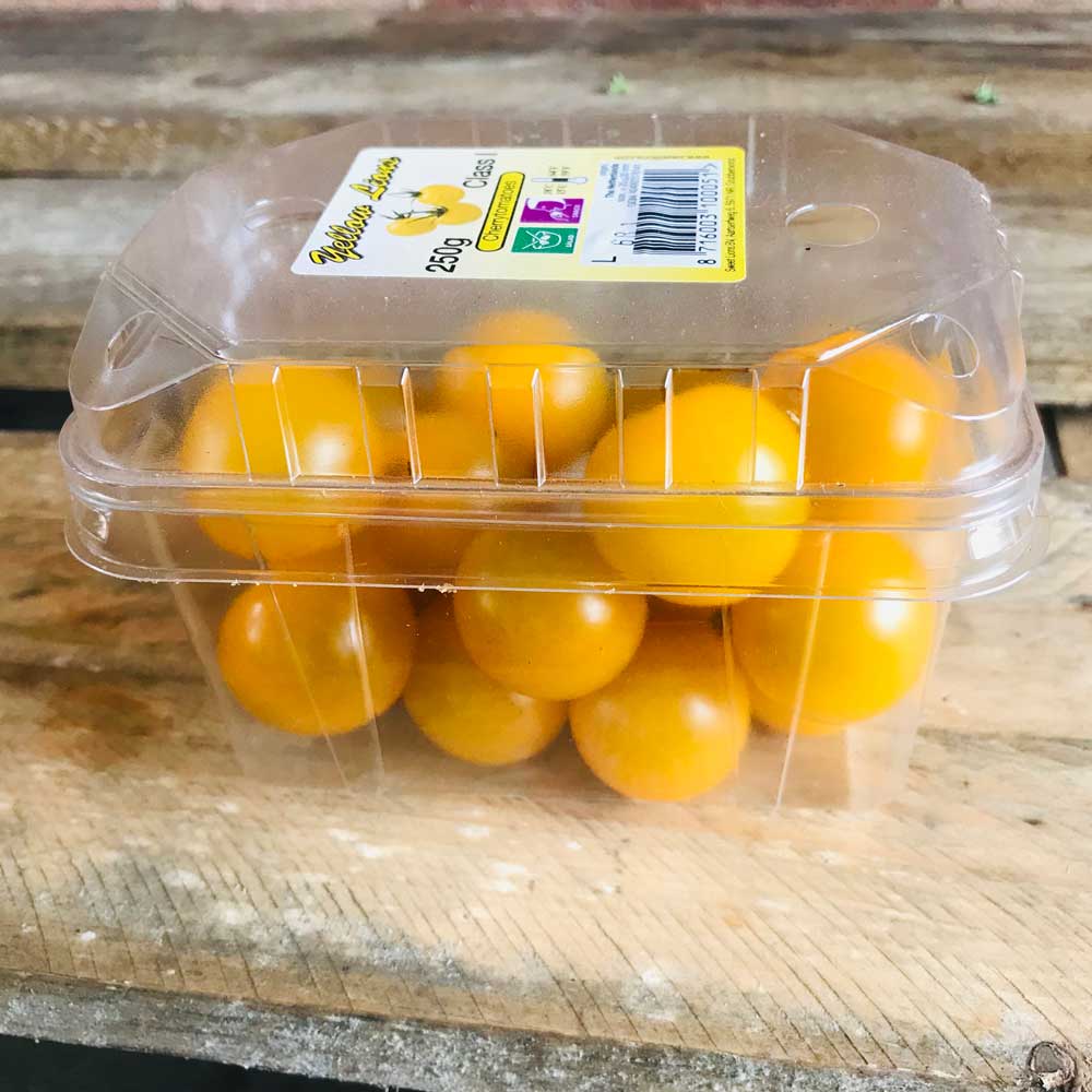 A punnet of yellow cherry tomatoes class 1